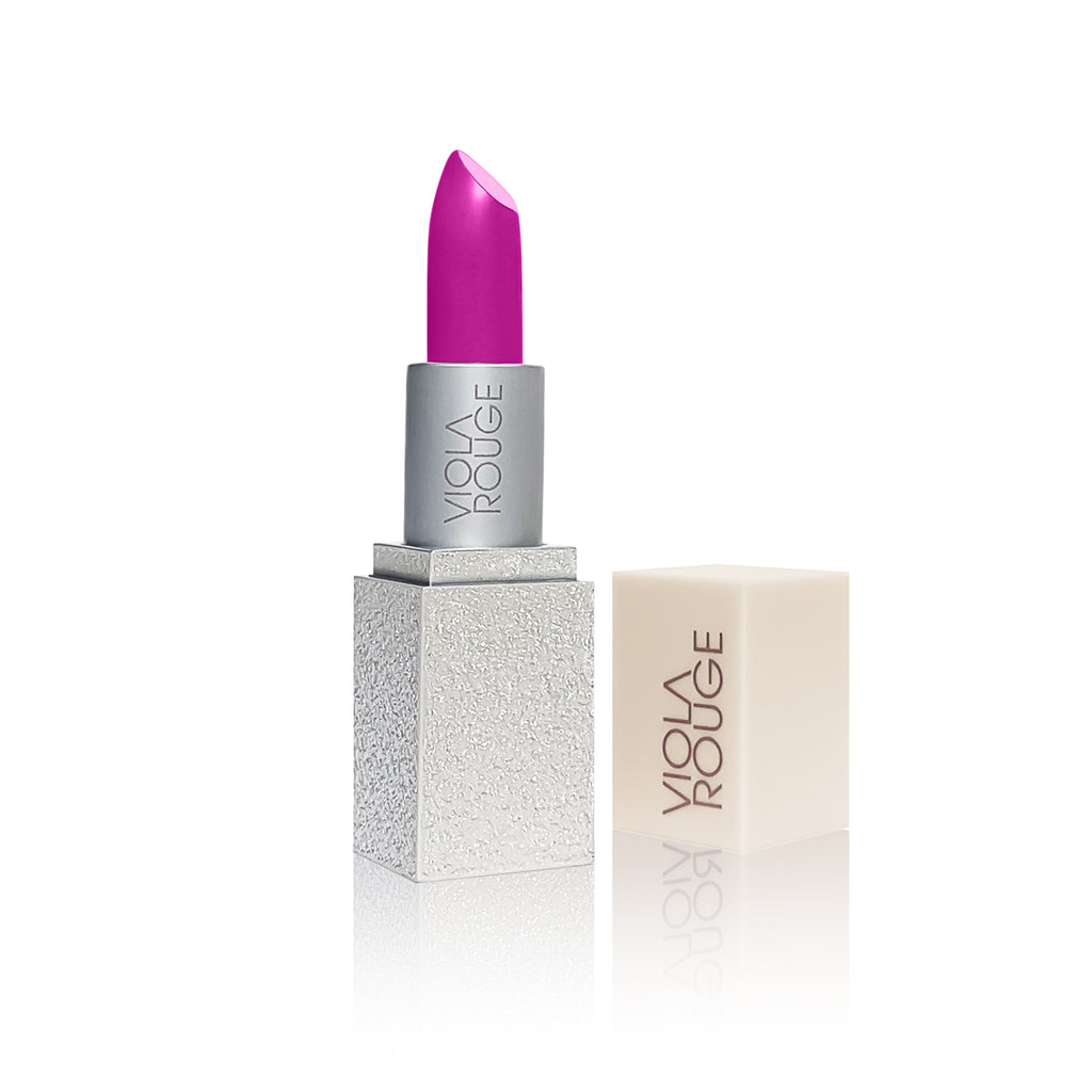  Image of VIOLA ROUGE lipstick in Blueberry Flower shade. Color of cosmetic is a deep fuchsia pink with a smooth and satiny texture.